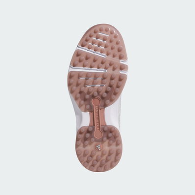 The Adidas MC Zoysia Ladies Spikeless Golf Shoes - Grey have a light brown rubber sole with raised, rounded treads and grooves for grip, plus adidas logo and Torsion System branding along the midfoot.