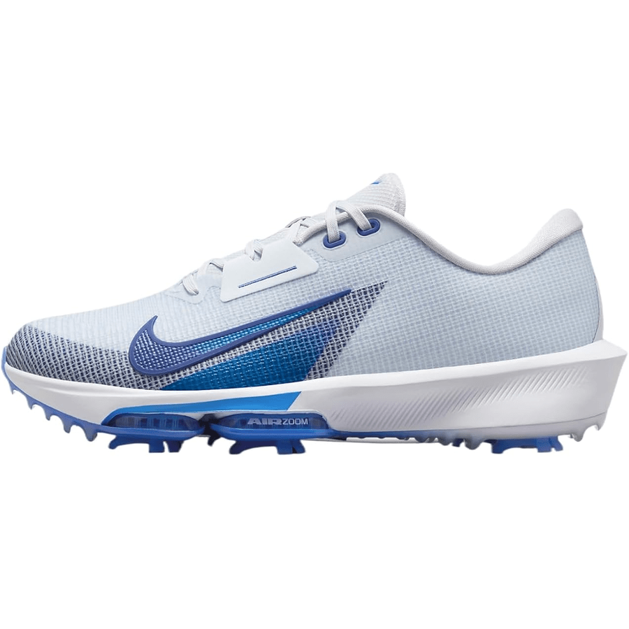 The Nike Air Zoom Infinity Tour NXT 2 Spikeless Golf Shoe in grey and blue features a gradient blue swoosh logo, blue accents, and a spikeless outsole for superior traction.