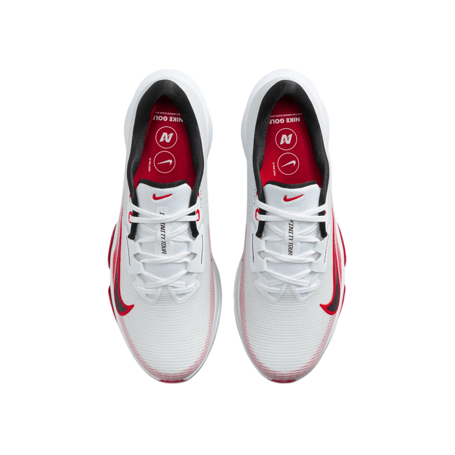 Top view of Nike Air Zoom Infinity Tour NXT 2 Spikeless Golf Shoes in white with red accents, black interior, and visible Nike logos on the insoles and tongue. The shoes are placed side by side on a white background.