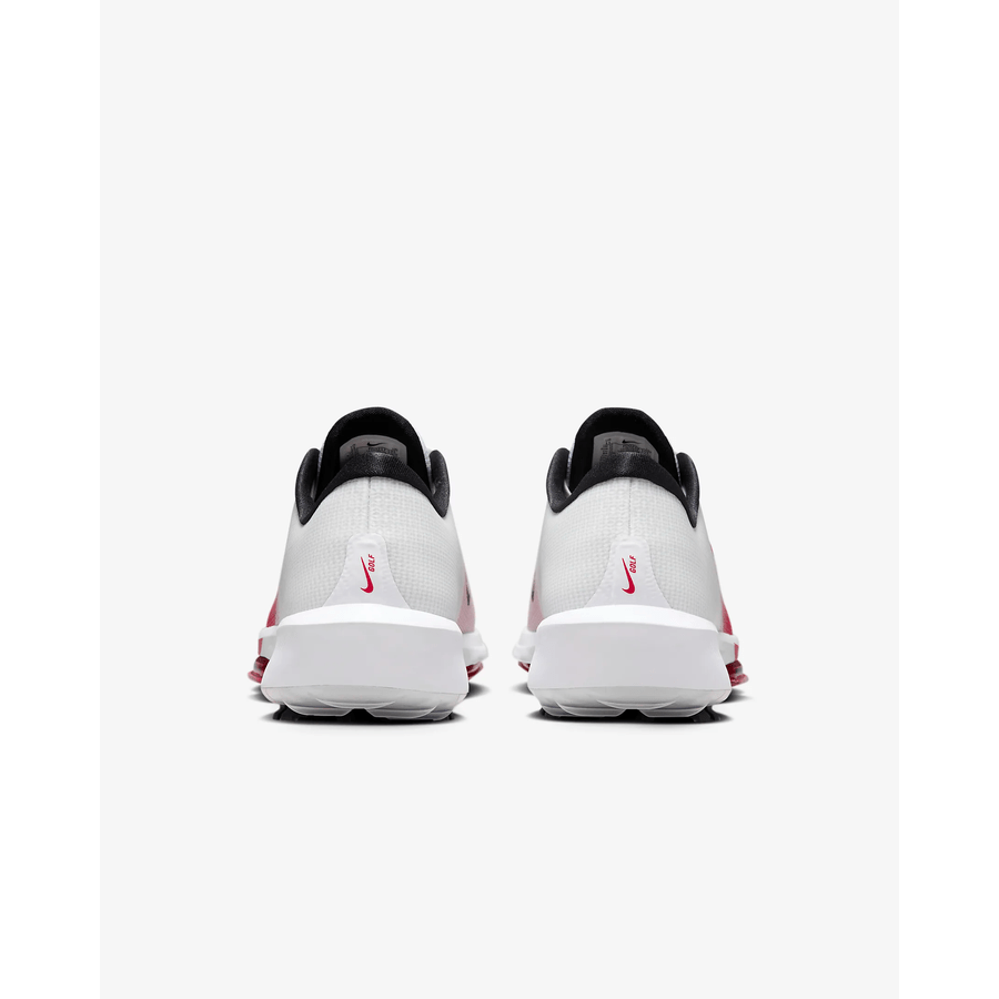 Back view of the Nike Air Zoom Infinity Tour NXT 2 Spikeless Golf Shoe in white/red, featuring black collars, red accents, a pink Nike swoosh on the heel, and a visible Air Zoom unit, set against a plain white background.