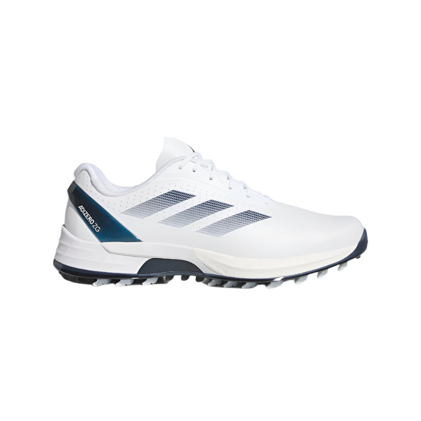 The Adidas Adizero ZG Spikeless Golf Shoes in white/blue feature navy accents, three stripes, Adidas logo, Lightstrike Pro cushioning, a textured grip sole, and a blue heel detail marked RESPONSIVE. Made with recycled and renewable materials.