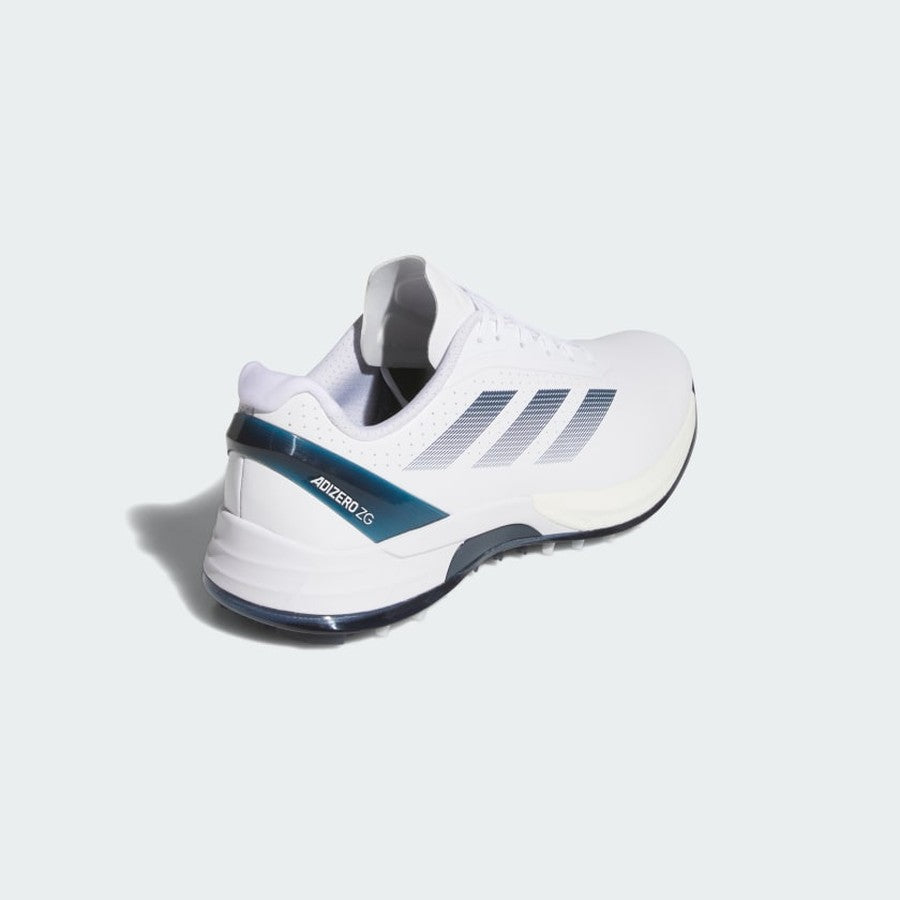 The Adidas Adizero ZG Spikeless Golf Shoes in White/Blue feature a blue-accented heel, three grey stripes, and Lightstrike Pro cushioning. Crafted with recycled and renewable materials, “ADIZERO TG” text appears on the rear against a light background.