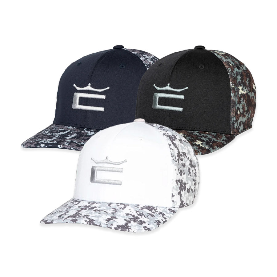 The Cobra Camo Crown C Snapback Cap features a crown-shaped logo above a letter C, Digi-camo Color Block design, and is available in black, navy blue, and white.