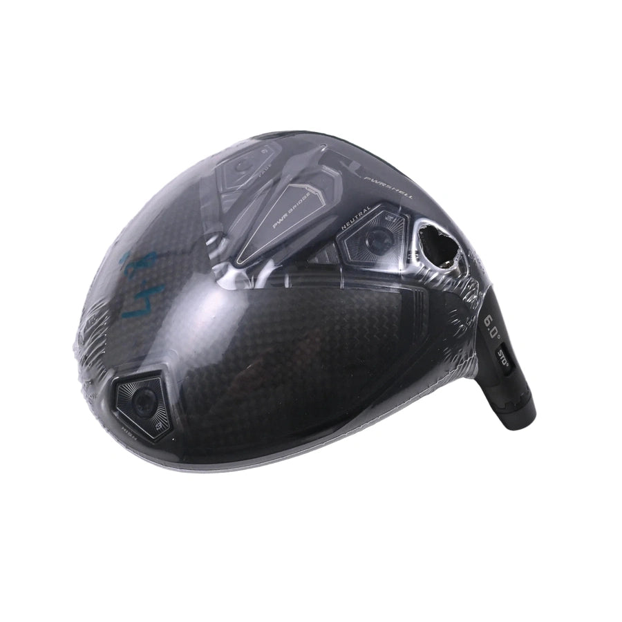 The Cobra Darkspeed Tour Issue Long Drive LS Driver with HZDRUS Green Shaft features a black head with metallic accents, visible adjustment screws, and a 9.0° loft—ideal for your next long drive.