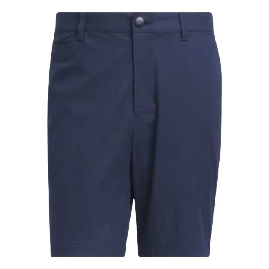 The Adidas Go-To Five-Pocket Golf Shorts in navy blue feature belt loops, a button closure, and side pockets, shown knee-length against a white background.