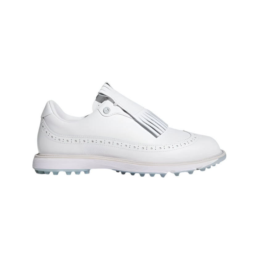 The Adidas MC Zoysia Ladies Spikeless Golf Shoes in white feature a textured sole, decorative perforations, and a fringed lace cover, displayed in a side view against a plain background.