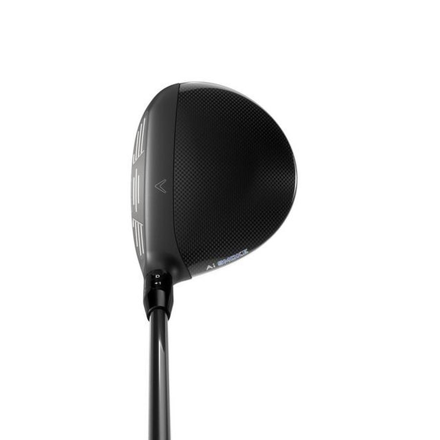 A close-up of the Callaway Paradym Ai Smoke Max Fairway Wood clubhead with a matte black finish and visible grooves, shown from above on a white background—featuring a Paradym Shift carbon chassis for advanced performance.