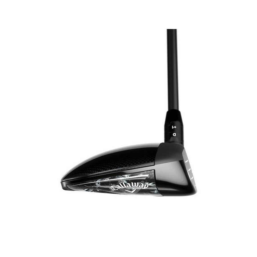 A close-up of a black Callaway Paradym Ai Smoke Max Fairway Wood club head displays the brand logo and design details, including the Paradym Shift carbon chassis, with part of the shaft visible against a white background.