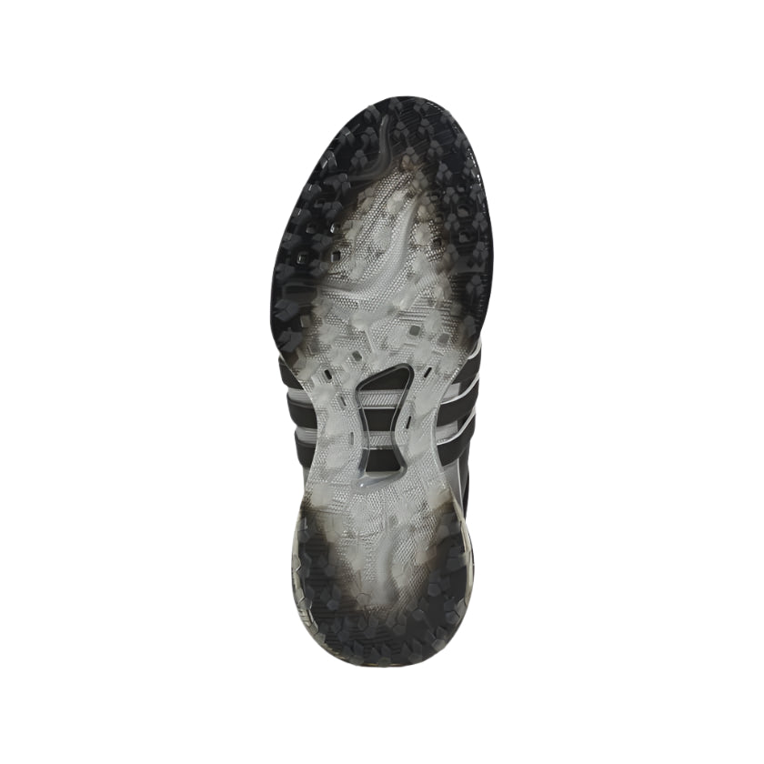 Bottom view of the Adidas Tour360 25 Spikeless Golf Shoes - Black, showcasing a black and white 3D Traxion outsole for superior grip. Ideal for running or outdoor sports, featured on a white background.