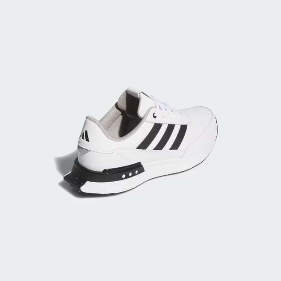 The Adidas S2G 24 Leather Spikeless Golf Shoes in White/Black feature black stripes and a black heel accent, shown from a back side angle on a light gray background.