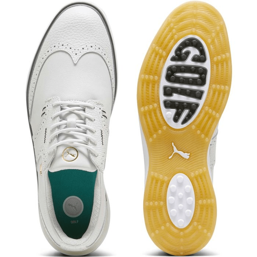 Top and bottom views of the PUMA Avant Wingtip Golf Shoes - Grey, featuring brogue detailing, green inner lining, a gold lace button, yellow spikeless grip sole, and “GOLF” in black and white. Stylish and waterproof for golf.