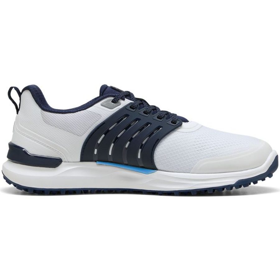 The Puma Ignite Elevate 2 Spikeless Golf Shoes in White/Navy feature a textured mesh upper, navy sole and accents, black laces, a dark heel tab, supportive side cage design, and FLOATPLATE Technology for comfort.