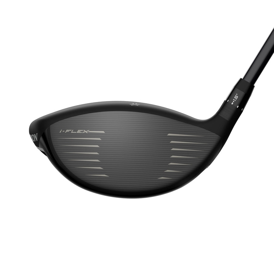 Close-up of a black Srixon ZXi LS Driver head with i-FLEX FACE text and horizontal grooves. It features a sleek design, adjustable sole weights for customization, and the shaft is attached to the head.