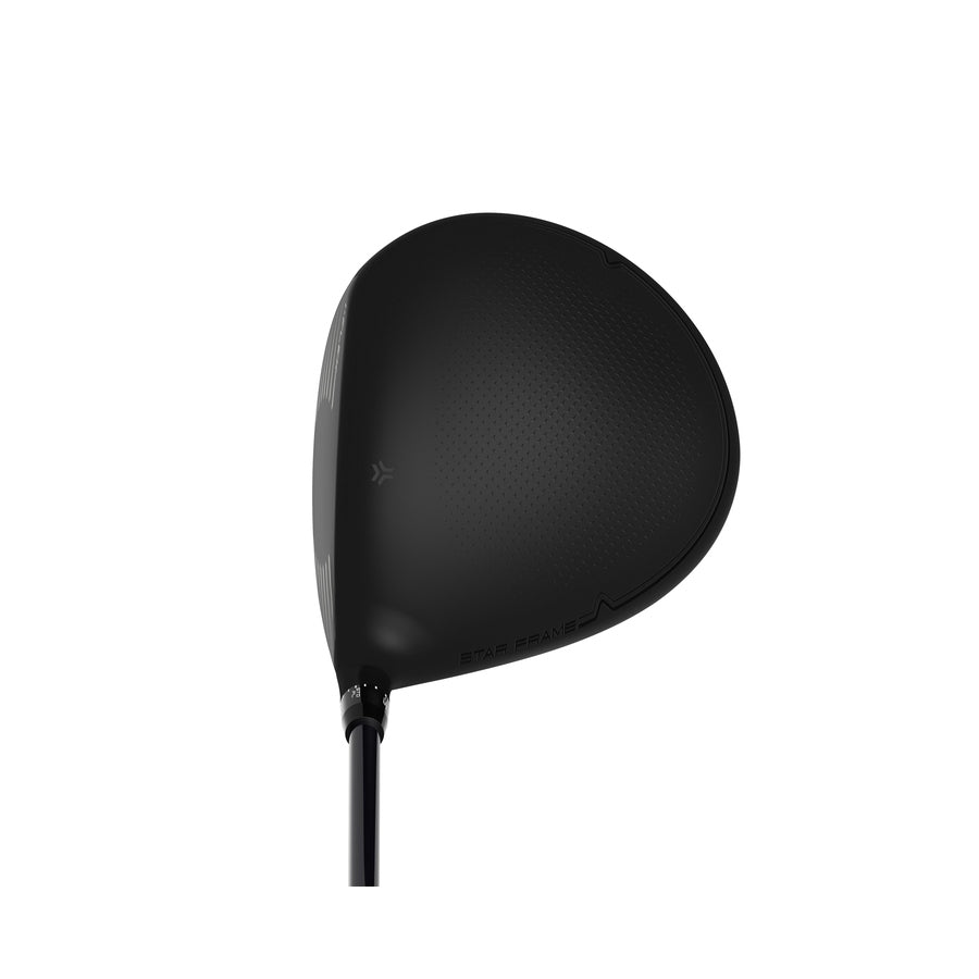 A close-up of the top of a Srixon ZXi Max Driver clubhead highlights its smooth matte black finish, subtle textured details, and a partially visible shaft.