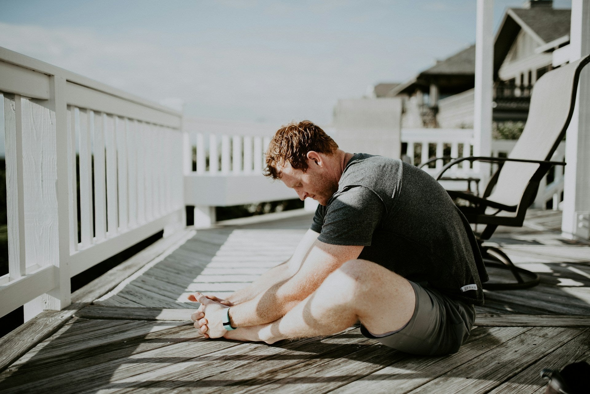 golf player stretching at home as a routine to improve his game