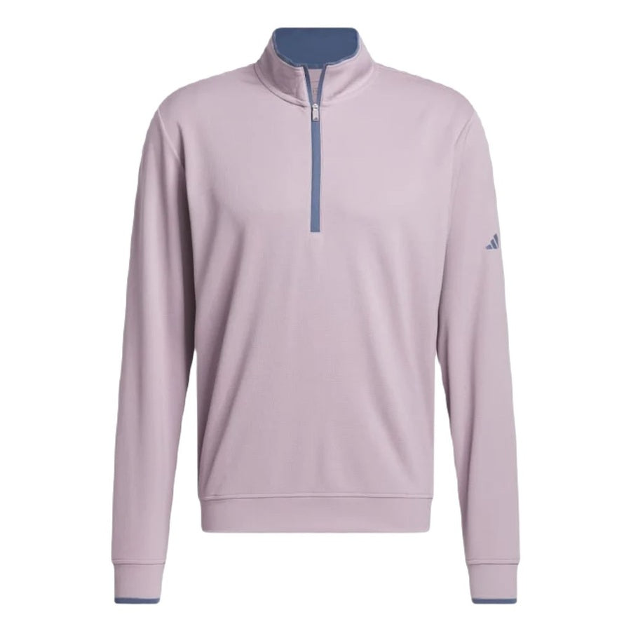 The Adidas Lightweight Half-Zip Top features a light purple color, blue quarter-zip collar and trim, adidas logo on the left sleeve, and is made with recycled materials for sustainable style. Final Sale.
