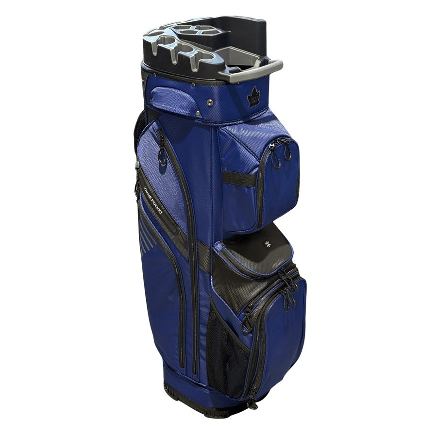 The NS Deluxe Tour Lock Organizer Cart Bag in blue and black features a 14-way top divider, multiple zippered pockets, an insulated cooler pocket, and a molded handle. The golf bag is shown standing upright against a white background.