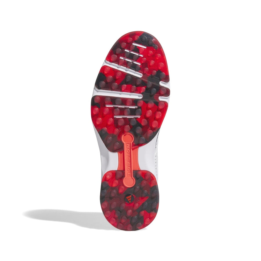 The image shows the sole of the Adidas MC80 Golf Shoes in White/Red, featuring a red, black, and white circular pattern with translucent sections and visible branding details. The shoe is photographed on a white background.