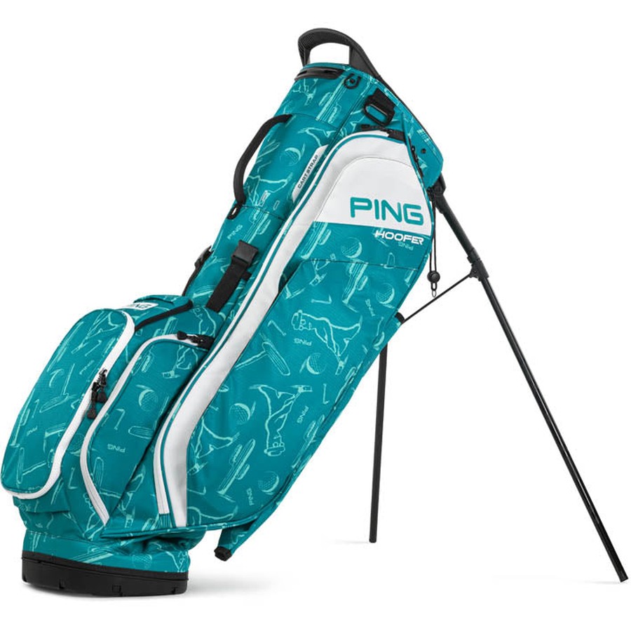 The Ping Hoofer 231 Golf Carry Bag is a lightweight teal bag with white accents and abstract line designs, featuring 16 pockets and a black dual-stand system for extra support.